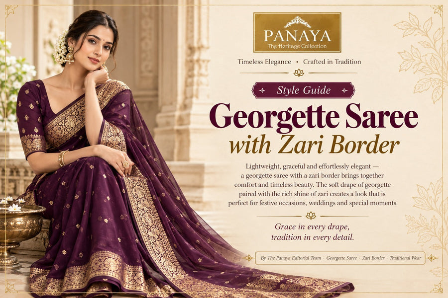 Purple georgette saree with zari border by Panaya. 